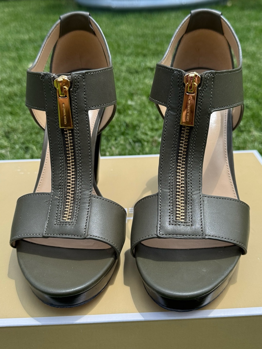 MICHAEL Michael Kors Olive Green T‑Strap Stacked Heel with Gold Zip Detail